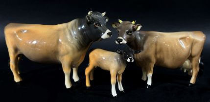 A Beswick group of a Jersey bull, cow and calf (3)