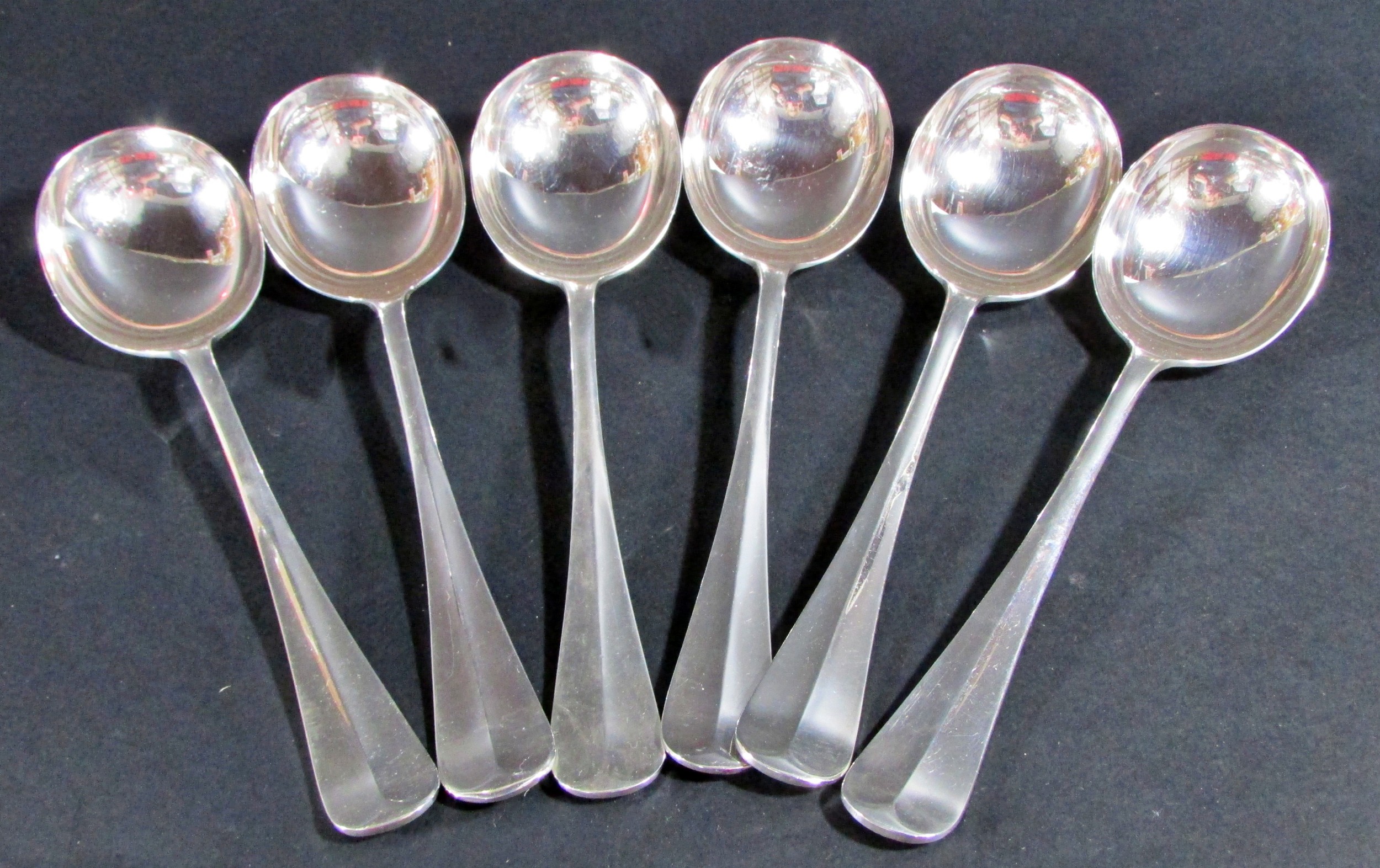 Six silver soup spoons, Birmingham 1931, maker Barker Brothers Silver Ltd, 16.6oz approx