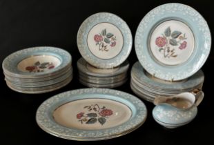 A collection of Imperial Jasper Rose dinnerware comprising four tureens, twelve dinner plates,