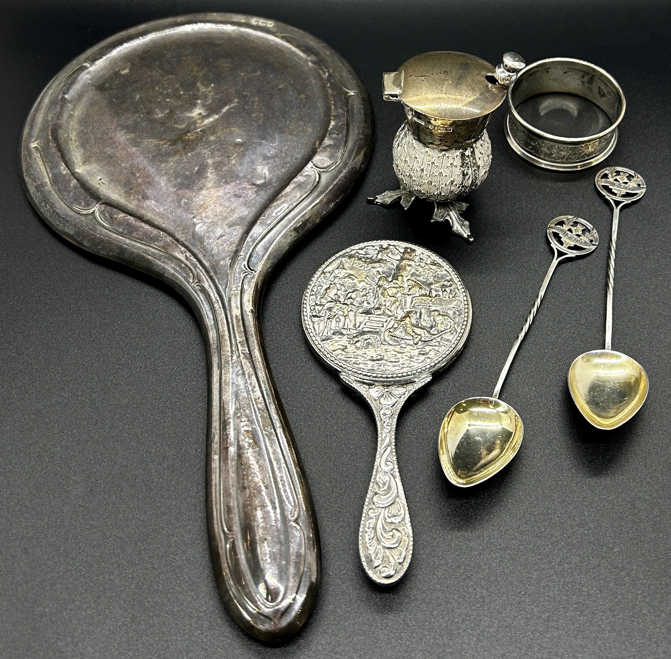 A quantity of silver including a hand mirror, napkin ring, two souvenir spoons, thistle salt pot and - Image 2 of 4