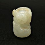 A Chinese carved white jade boy and goose group, Late Qing/Republic period, carved to depict a boy