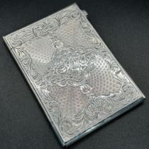 A Victorian silver card case with floral engraving, London 1867, makers mark rubbed, 10cm x 7cm, 3.