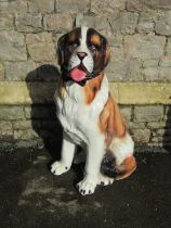 A life size ceramic model of a St Bernard dog