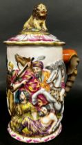 A Capodimonte porcelain tankard, decorated with battle scene, the handle formed from an elephants
