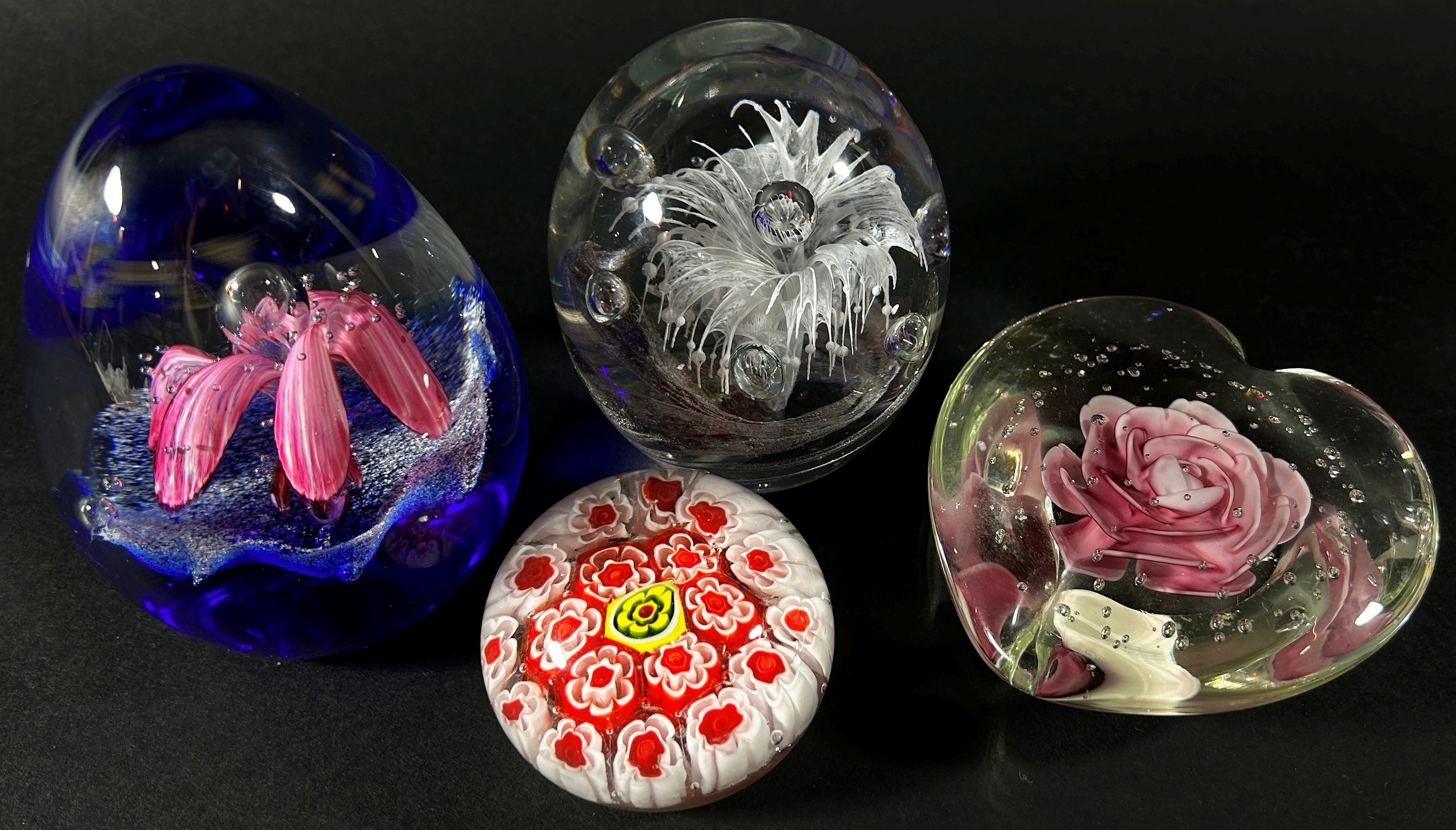 A collection of glass paperweights to include a Caithness ‘Fae Pink’ example with box, two exotic - Image 2 of 2