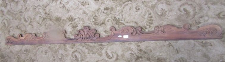 A Regency rosewood shaped wall piece