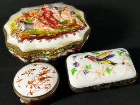 A Capodimonte porcelain box with character and floral relief detail and two further boxes one with
