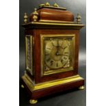 A late 19th century Georgian style bracket clock, the rosewood case with applied brass detail, the