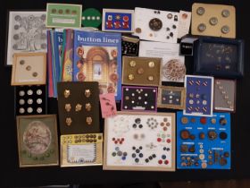A collection of unusual and novelty buttons including educational cards illustrating different
