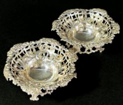 A pair of Victorian silver pierced dishes, one hallmarked London, the other Birmingham, 7 cm