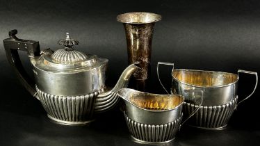 A three piece silver tea set, Birmingham 1900 maker Henry Willliamson Ltd, and a weighted silver