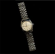 Rolex. An Oyster Precision Speedking wristwatch, with black Arabic numerals, on associated