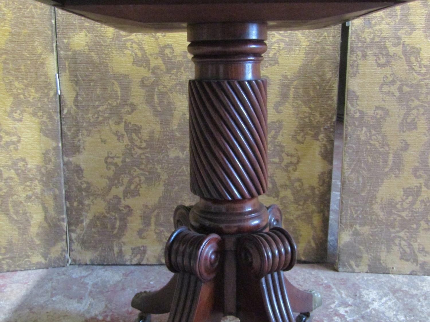 A Regency mahogany D end tea table the swivel top raised on a cylindrical spiral column stem and - Image 6 of 7