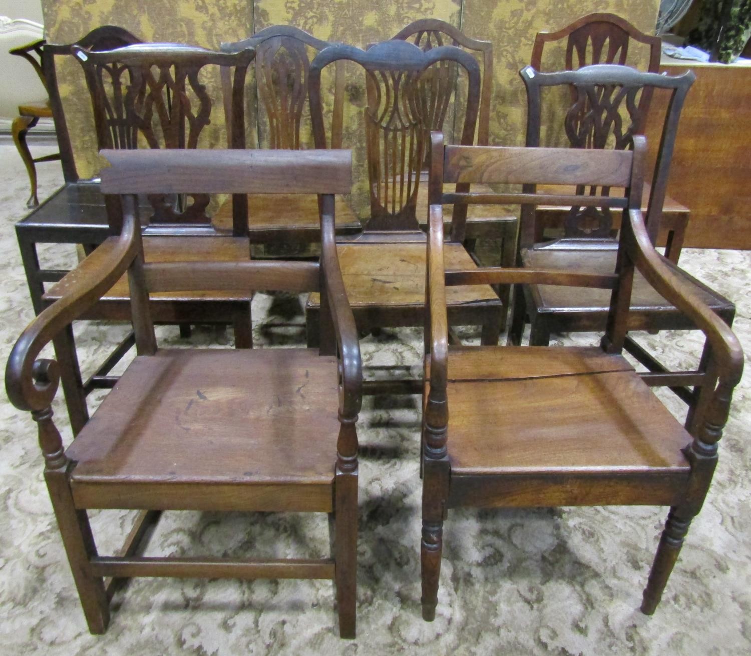 Nine Georgian oak country made dining chairs of varying design (af)