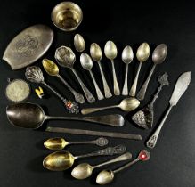 A miscellaneous collection of silver spoons, forks, a small bowl, a brush back, etc., 9.5 ozs all in