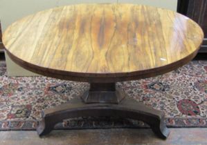A Regency rosewood centre table, the circular top raised on a tricorn pillar and base, 135cm