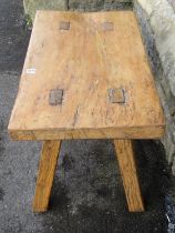 An old wooden pig bench on four square oak pegged supports, 77cm x 44cm x 48 cm high.