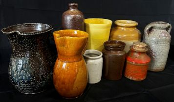 A quantity of mixed studio and other pottery to include two two-divisional English slipware dished