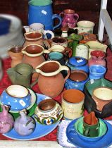 A mixed group of British studio pottery, jugs etc to include Torquay and other examples