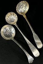 A Scottish William IV silver sugar casting spoon, Edinburgh 1827, maker William Marshall, together