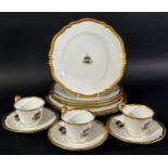 A Copeland Armorial part tea/dinner service comprising two large plates, four side plates, three tea