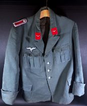 German Third Reich period military interest. A German military tunic mid green buttons all stamped