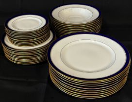 A collection of Royal Worcester Howard pattern dinner ware comprising eleven dinner plates, eleven