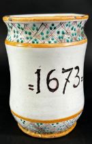 An Apothecaries jar date mark 1673, with armorial panel, 14cm