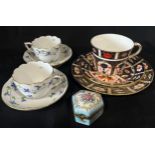 A pair of Doulton Lambeth vases, a Crown Derby Imari pattern trio, A pair of Herend cups and