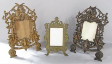 A pair of Rococo frames with cherubs and scrolling to the gold finished frames 36cm x 23cm