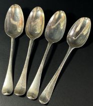 A group of eight silver dinner spoons, mixed makers from London, 16.5 ozs approximatley