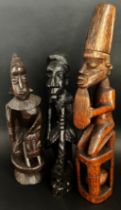 A group of African / likely Nigerian / Yoruba hardwood carvings to include a small bowl with figural