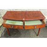 An early 19th century mahogany bow-front two drawer side table raised on squared tapered supports