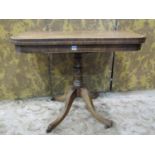 An early 19th century mahogany fold over top tea table of rectangular form with rounded corners,