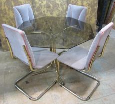 A 1980s dining room set comprising a table with smoke glass top table and four cantilever dining