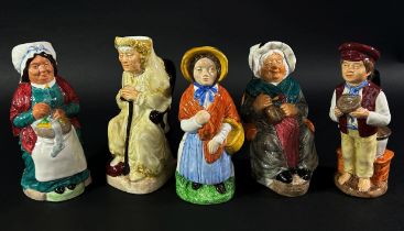 A collection of twelve character jugs by Wood & Sons - Charles Dickens Toby jug collection