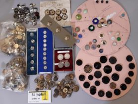 A mixed collection of decorative buttons including Middle Eastern silver buttons, Austrian waistcoat