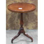 An inlaid mahogany wine table, 49 cm high x 30 cm diameter