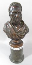 A Victorian bronze bust of General Charles Napier, in classical robes, raised on a marble column,