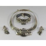 Mexican stylised silver jewellery suite comprising collar necklace, cuff bracelet and pair of drop
