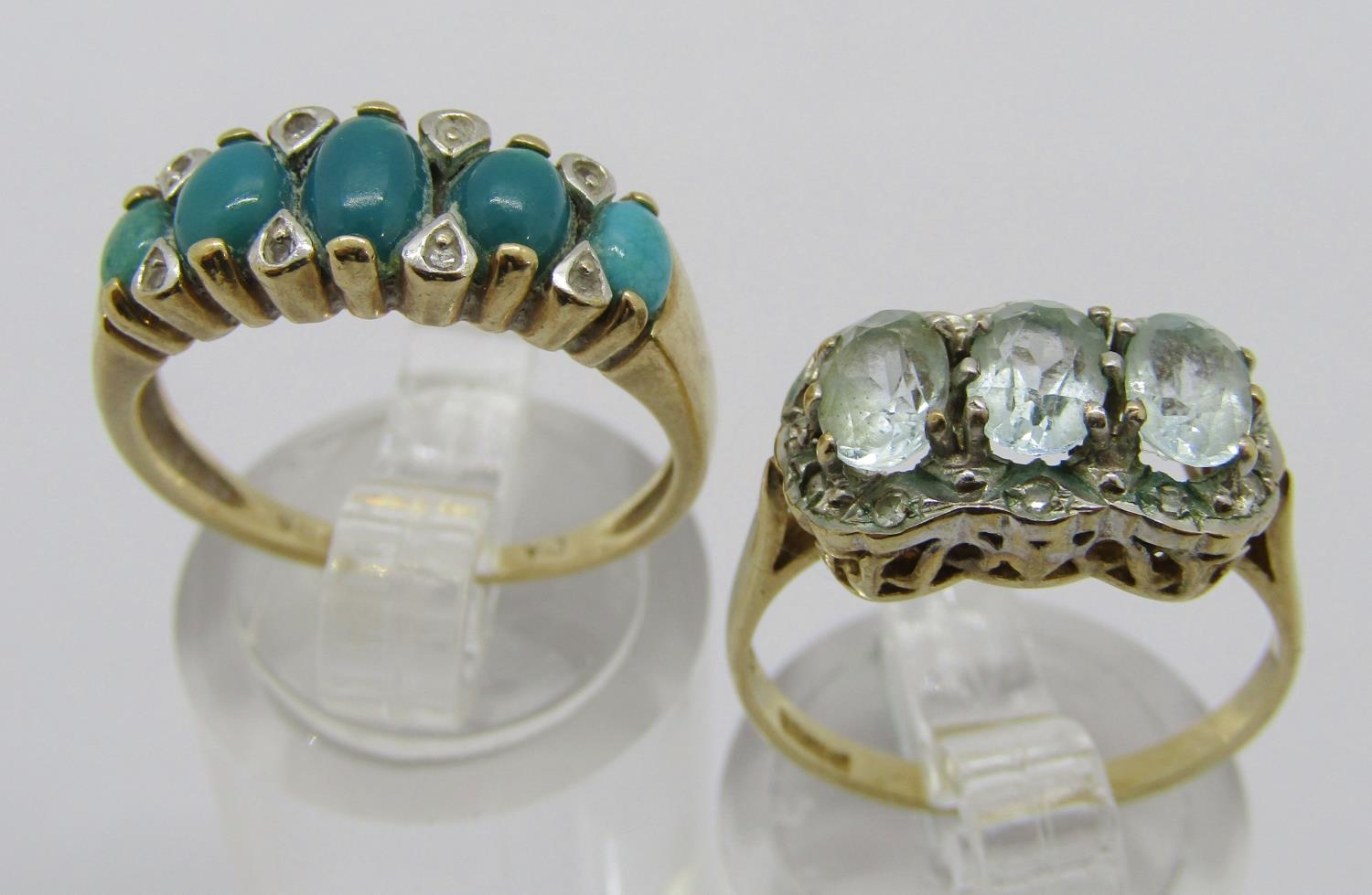 Two 9ct gem and diamond set dress rings; a three stone spinel example, size N and a graduated five