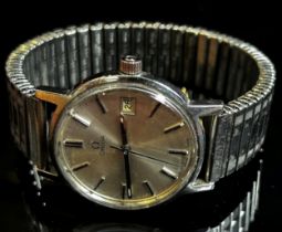 Omega: a gentleman’s vintage stainless steel wristwatch, the silvered dial with date aperture and