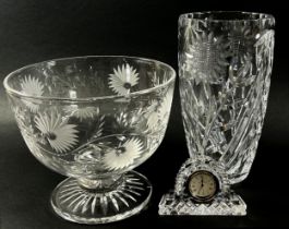 A mixed selection of heavily cut glass fruit bowls, vases, a dish with cover, and a Waterford