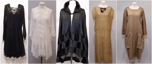 A collection of five 1920's ladies' garments comprising a black dress of chiffon and silk with