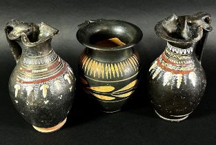 Three Etruscan vases with repeating detail