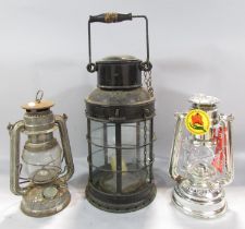 A 19th century metal five glass panel storm lamp with a single candle holder, a later oil