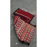 A North African Tribal flat weave saddle bag with a geometric repeating pattern.