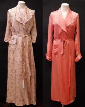 1930's dressing gown with quilted cuff and collar in salmon pink satin together with a 1950's
