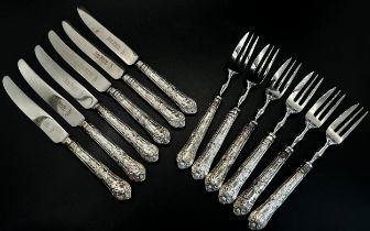 A cased set of silver handled tea knives and a cased set of forks, and a tortoiseshell and silver