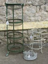 A cast iron and wirework four tier graduated vegetable stand 85 cm high together with a painted